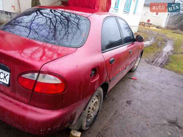 Красный Дэу Ланос, объемом двигателя 1.3 л и пробегом 226 тыс. км за 1500 $, фото 3 на Automoto.ua