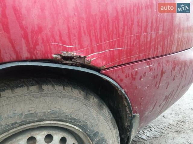 Красный Дэу Ланос, объемом двигателя 1.3 л и пробегом 226 тыс. км за 1500 $, фото 5 на Automoto.ua