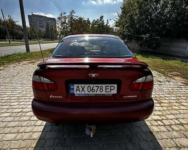 Красный Дэу Ланос, объемом двигателя 1.5 л и пробегом 326 тыс. км за 3100 $, фото 3 на Automoto.ua