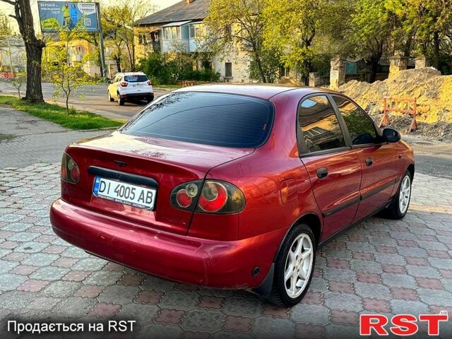 Красный Дэу Ланос, объемом двигателя 1.5 л и пробегом 300 тыс. км за 1699 $, фото 4 на Automoto.ua