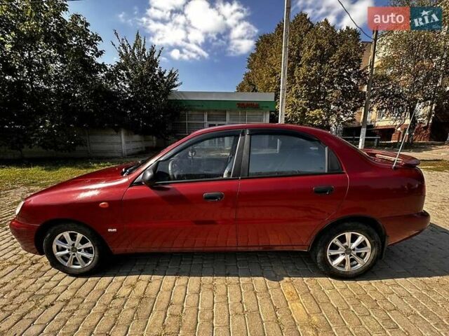 Красный Дэу Ланос, объемом двигателя 1.5 л и пробегом 326 тыс. км за 3100 $, фото 23 на Automoto.ua