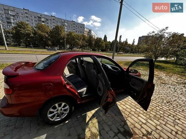 Красный Дэу Ланос, объемом двигателя 1.5 л и пробегом 326 тыс. км за 3100 $, фото 10 на Automoto.ua
