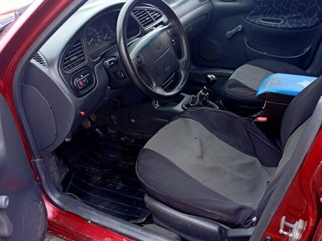 Червоний Деу Ланос, об'ємом двигуна 1.5 л та пробігом 303 тис. км за 1550 $, фото 9 на Automoto.ua