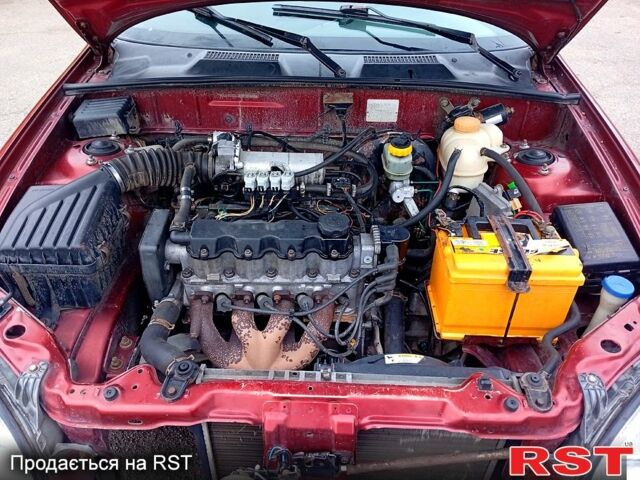 Червоний Деу Ланос, об'ємом двигуна 1.5 л та пробігом 303 тис. км за 1550 $, фото 10 на Automoto.ua