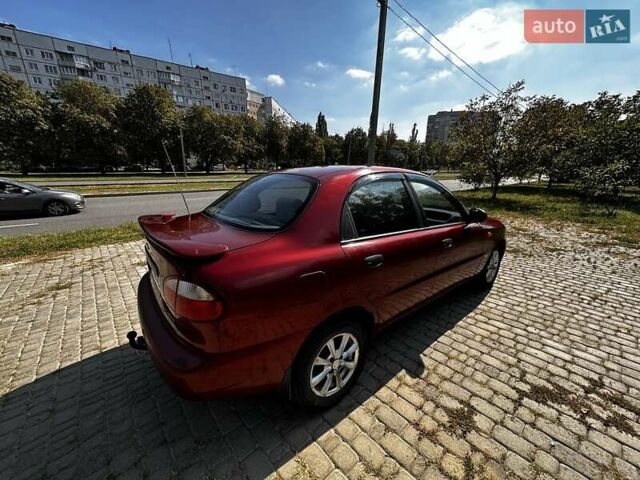 Красный Дэу Ланос, объемом двигателя 1.5 л и пробегом 326 тыс. км за 3100 $, фото 2 на Automoto.ua