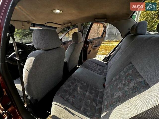 Красный Дэу Ланос, объемом двигателя 1.5 л и пробегом 326 тыс. км за 3100 $, фото 18 на Automoto.ua