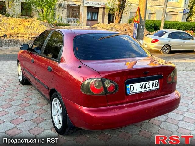 Красный Дэу Ланос, объемом двигателя 1.5 л и пробегом 300 тыс. км за 1699 $, фото 6 на Automoto.ua