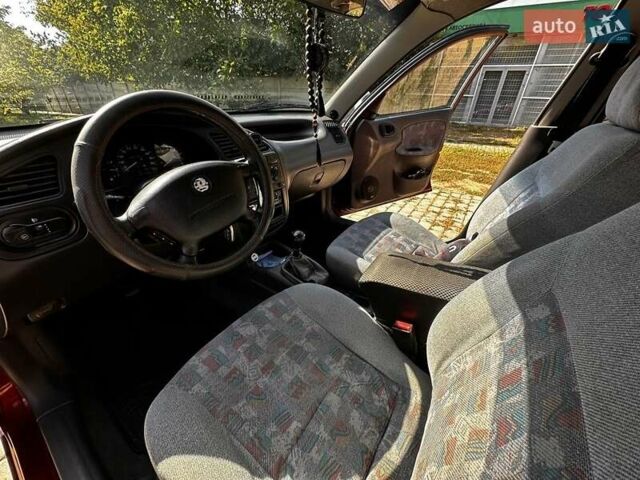 Красный Дэу Ланос, объемом двигателя 1.5 л и пробегом 326 тыс. км за 3100 $, фото 16 на Automoto.ua