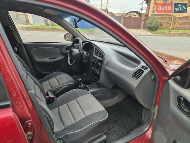 Червоний Деу Ланос, об'ємом двигуна 1.5 л та пробігом 313 тис. км за 2250 $, фото 7 на Automoto.ua