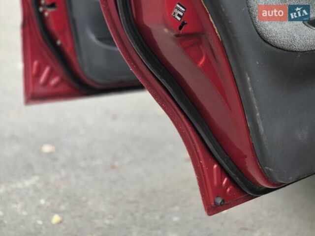 Червоний Деу Ланос, об'ємом двигуна 1.5 л та пробігом 313 тис. км за 2200 $, фото 5 на Automoto.ua