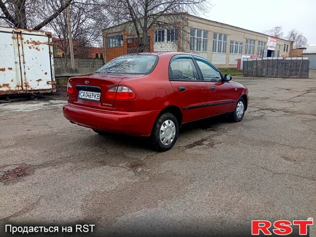 Червоний Деу Ланос, об'ємом двигуна 1.5 л та пробігом 303 тис. км за 1550 $, фото 3 на Automoto.ua