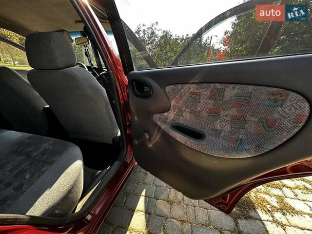 Красный Дэу Ланос, объемом двигателя 1.5 л и пробегом 326 тыс. км за 3100 $, фото 20 на Automoto.ua
