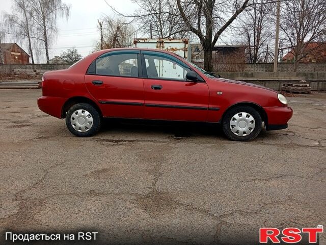 Червоний Деу Ланос, об'ємом двигуна 1.5 л та пробігом 303 тис. км за 1550 $, фото 5 на Automoto.ua