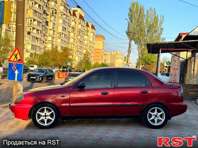 Красный Дэу Ланос, объемом двигателя 1.5 л и пробегом 300 тыс. км за 1699 $, фото 9 на Automoto.ua