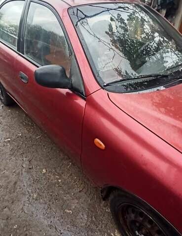 Красный Дэу Ланос, объемом двигателя 1.5 л и пробегом 150 тыс. км за 1000 $, фото 1 на Automoto.ua