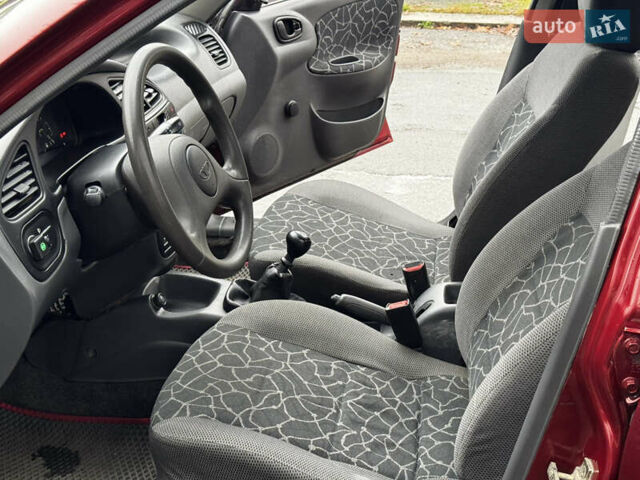 Красный Дэу Ланос, объемом двигателя 1.5 л и пробегом 139 тыс. км за 2600 $, фото 14 на Automoto.ua