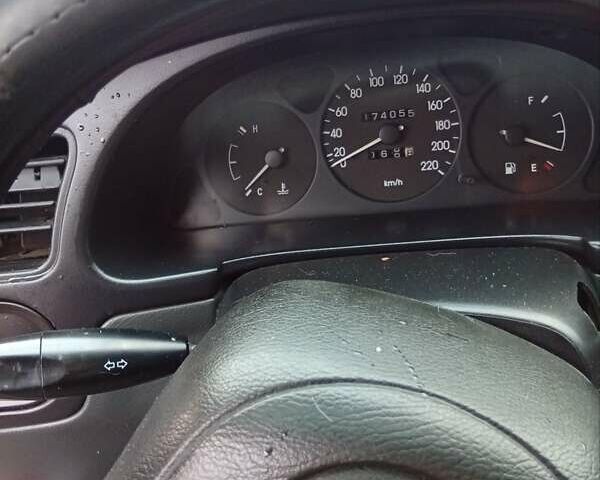 Червоний Деу Ланос, об'ємом двигуна 1.5 л та пробігом 174 тис. км за 1550 $, фото 12 на Automoto.ua