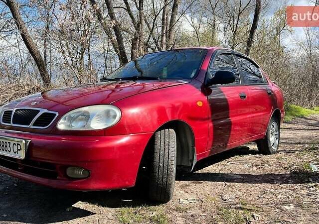 Червоний Деу Ланос, об'ємом двигуна 1.5 л та пробігом 408 тис. км за 1900 $, фото 1 на Automoto.ua