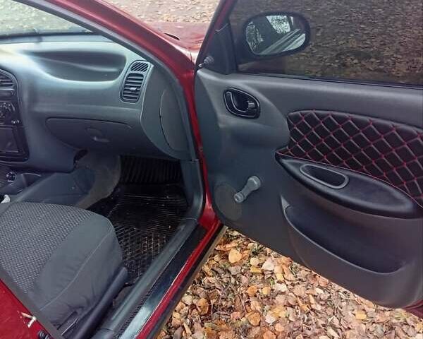 Червоний Деу Ланос, об'ємом двигуна 1.5 л та пробігом 174 тис. км за 1550 $, фото 9 на Automoto.ua