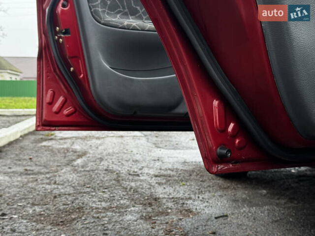 Красный Дэу Ланос, объемом двигателя 1.5 л и пробегом 139 тыс. км за 2600 $, фото 8 на Automoto.ua