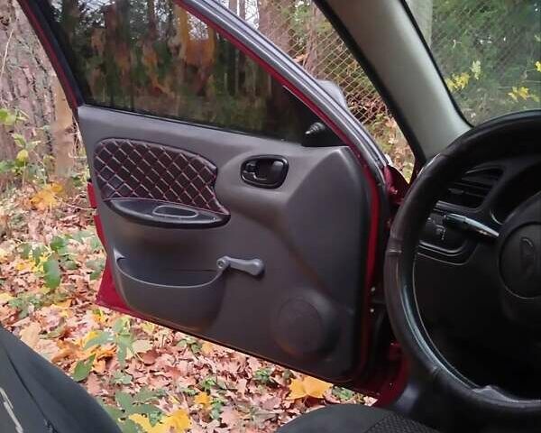 Красный Дэу Ланос, объемом двигателя 1.5 л и пробегом 174 тыс. км за 1750 $, фото 7 на Automoto.ua