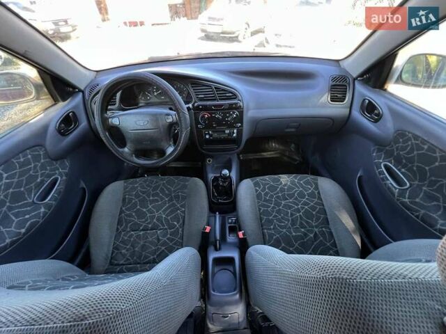 Червоний Деу Ланос, об'ємом двигуна 1.6 л та пробігом 277 тис. км за 1750 $, фото 17 на Automoto.ua