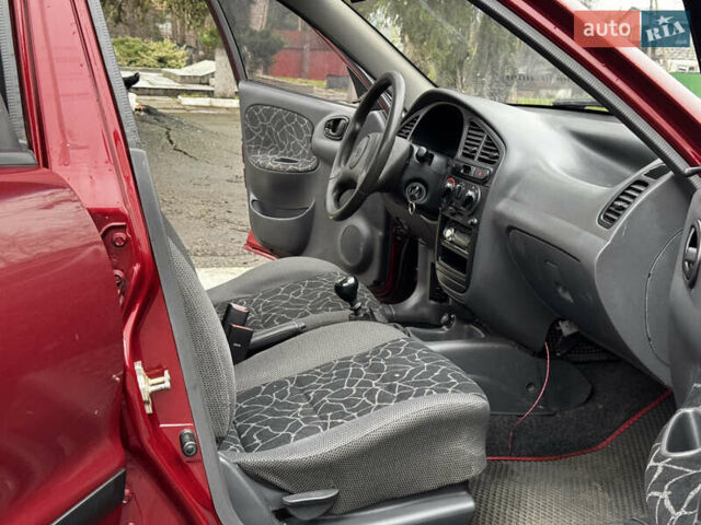 Красный Дэу Ланос, объемом двигателя 1.5 л и пробегом 139 тыс. км за 2600 $, фото 12 на Automoto.ua