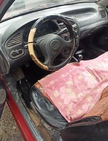 Красный Дэу Ланос, объемом двигателя 1.5 л и пробегом 150 тыс. км за 1000 $, фото 5 на Automoto.ua