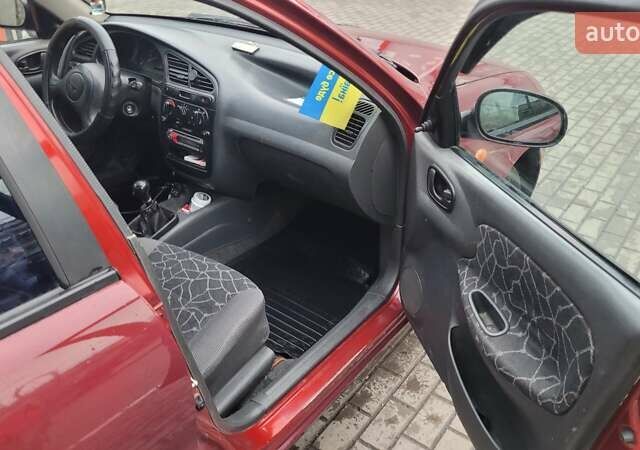 Красный Дэу Ланос, объемом двигателя 1.5 л и пробегом 283 тыс. км за 2800 $, фото 4 на Automoto.ua