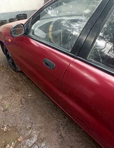 Красный Дэу Ланос, объемом двигателя 1.5 л и пробегом 150 тыс. км за 1000 $, фото 8 на Automoto.ua