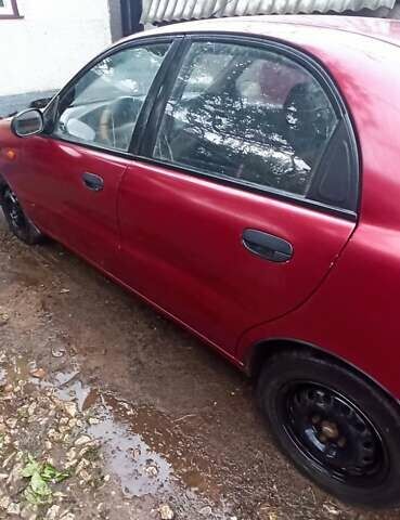 Красный Дэу Ланос, объемом двигателя 1.5 л и пробегом 150 тыс. км за 1000 $, фото 4 на Automoto.ua