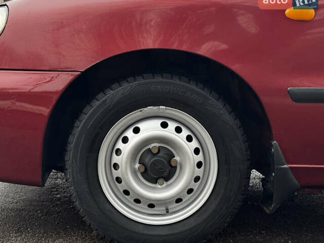 Красный Дэу Ланос, объемом двигателя 1.5 л и пробегом 139 тыс. км за 2600 $, фото 7 на Automoto.ua