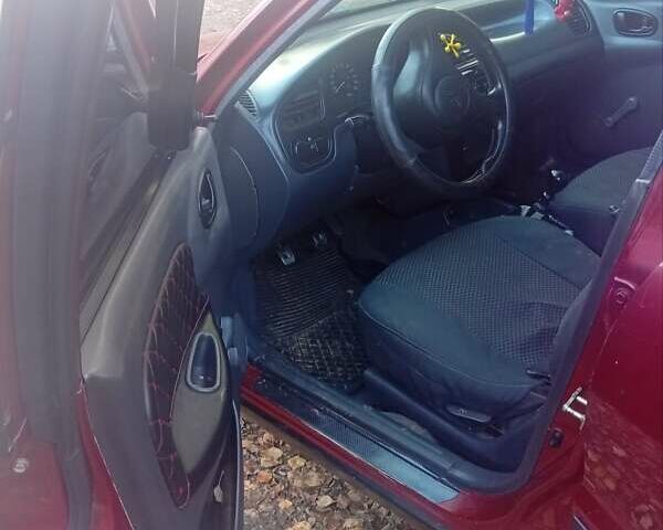 Красный Дэу Ланос, объемом двигателя 1.5 л и пробегом 174 тыс. км за 1700 $, фото 7 на Automoto.ua