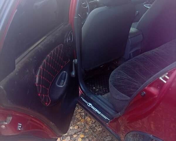 Красный Дэу Ланос, объемом двигателя 1.5 л и пробегом 174 тыс. км за 1700 $, фото 3 на Automoto.ua