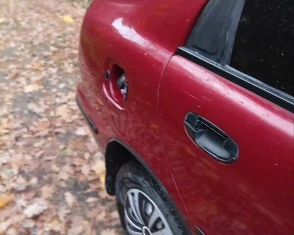 Красный Дэу Ланос, объемом двигателя 1.5 л и пробегом 174 тыс. км за 1750 $, фото 1 на Automoto.ua