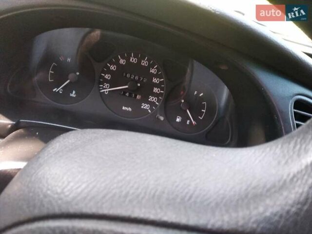 Червоний Деу Ланос, об'ємом двигуна 1.5 л та пробігом 162 тис. км за 2400 $, фото 9 на Automoto.ua