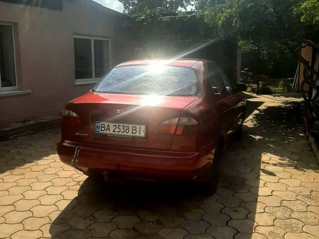 Красный Дэу Ланос, объемом двигателя 1.5 л и пробегом 203 тыс. км за 1650 $, фото 5 на Automoto.ua