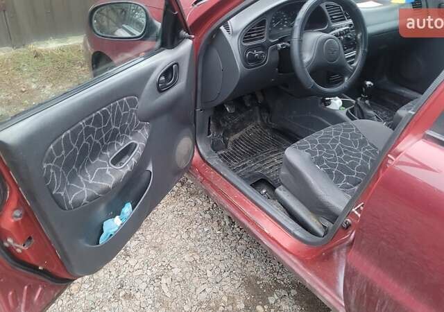 Красный Дэу Ланос, объемом двигателя 1.5 л и пробегом 283 тыс. км за 2800 $, фото 7 на Automoto.ua