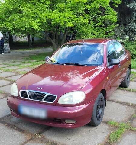 Красный Дэу Ланос, объемом двигателя 1.5 л и пробегом 283 тыс. км за 2800 $, фото 1 на Automoto.ua