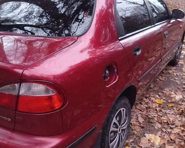 Красный Дэу Ланос, объемом двигателя 1.5 л и пробегом 174 тыс. км за 1750 $, фото 4 на Automoto.ua