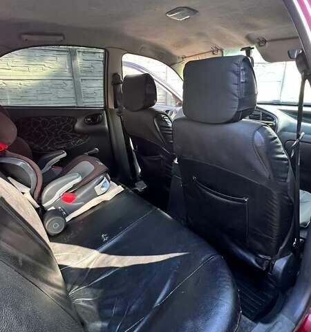 Червоний Деу Ланос, об'ємом двигуна 1.5 л та пробігом 408 тис. км за 1900 $, фото 7 на Automoto.ua
