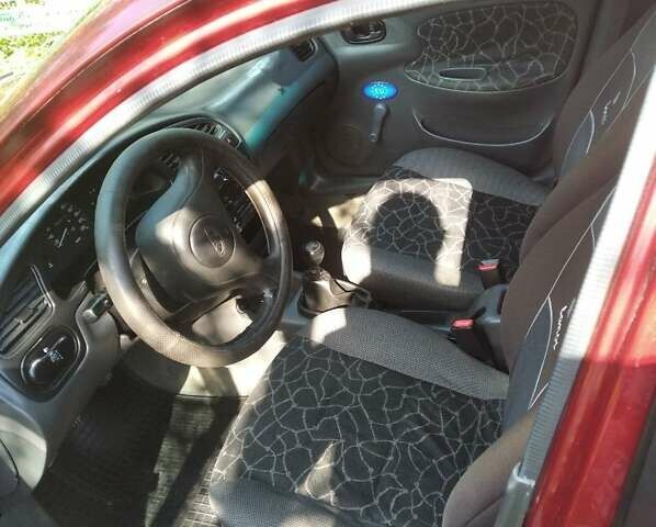 Червоний Деу Ланос, об'ємом двигуна 1.5 л та пробігом 162 тис. км за 2400 $, фото 13 на Automoto.ua