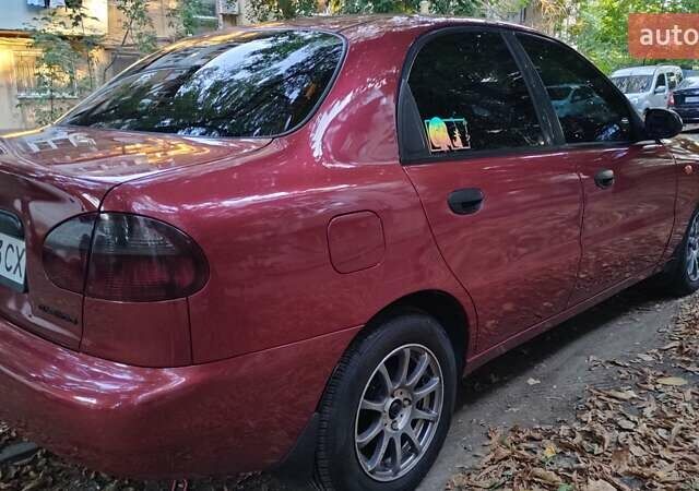 Червоний Деу Ланос, об'ємом двигуна 1.5 л та пробігом 275 тис. км за 3300 $, фото 4 на Automoto.ua