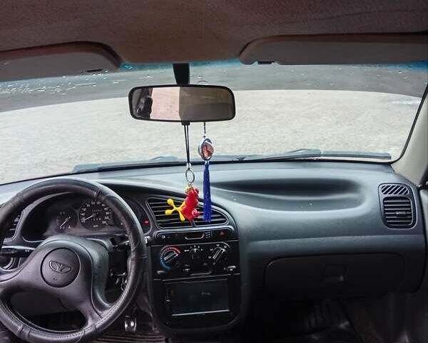 Красный Дэу Ланос, объемом двигателя 1.5 л и пробегом 174 тыс. км за 1550 $, фото 8 на Automoto.ua