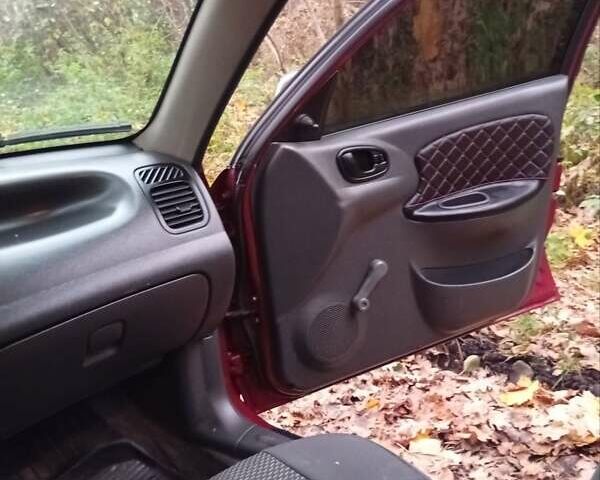 Красный Дэу Ланос, объемом двигателя 1.5 л и пробегом 174 тыс. км за 1750 $, фото 6 на Automoto.ua