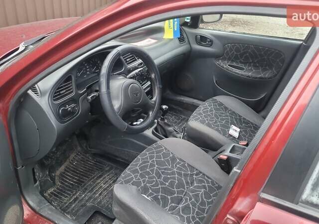 Красный Дэу Ланос, объемом двигателя 1.5 л и пробегом 283 тыс. км за 2800 $, фото 5 на Automoto.ua