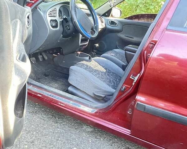 Дэу Ланос 2004 в Одессе на Automoto.ua Красный Дэу Ланос, объемом двигателя 1.6 л и пробегом 217 тыс. км за 2599 $, фото 4 на Automoto.ua