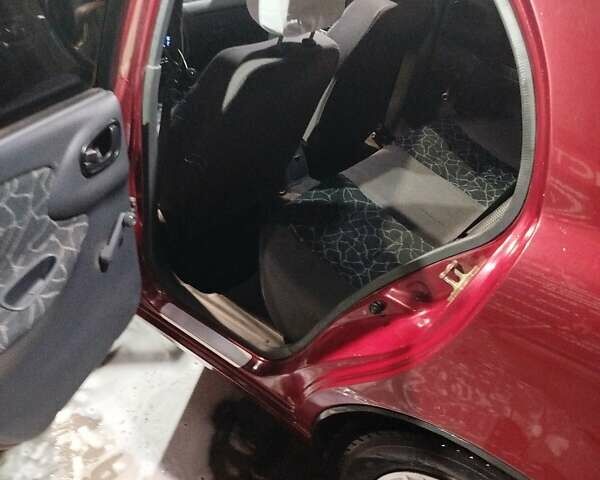 Красный Дэу Ланос, объемом двигателя 1.5 л и пробегом 200 тыс. км за 2250 $, фото 5 на Automoto.ua