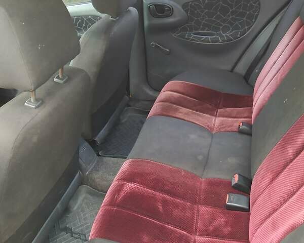 Червоний Деу Ланос, об'ємом двигуна 1.5 л та пробігом 208 тис. км за 1200 $, фото 8 на Automoto.ua