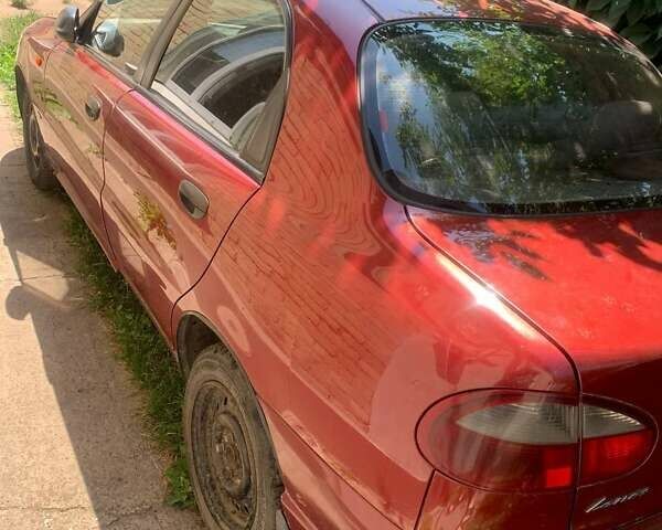 Червоний Деу Ланос, об'ємом двигуна 1.6 л та пробігом 350 тис. км за 1900 $, фото 4 на Automoto.ua